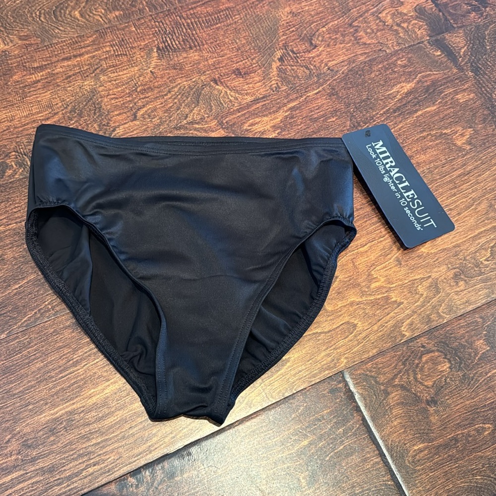 NWT - Black Miracle Suit Swim Bottoms Size 12 style is “basic pant”